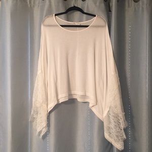 White top with lace statement sleeves